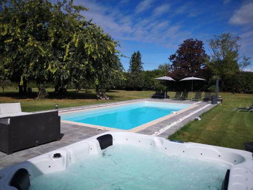 a swimming pool in a backyard with at Le Petit Domaine de Colayrac in Colayrac-Saint-Cirq
