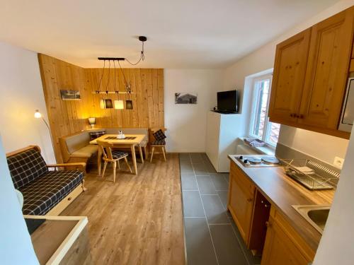 Kuchyň nebo kuchyňský kout v ubytování Gästehaus Alpvital