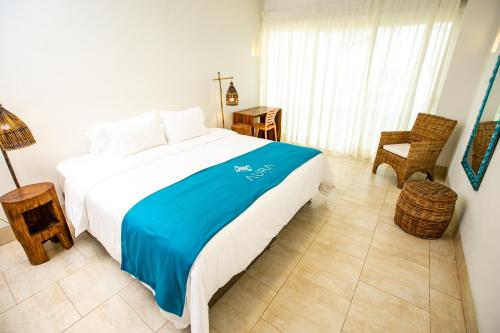 
Cama o camas de una habitación en Aura Hotel Barú
