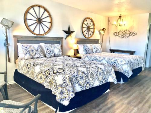 Postel nebo postele na pokoji v ubytování Best Inn Texas