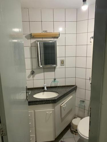 Ένα μπάνιο στο Flat Golden Thermas Residence