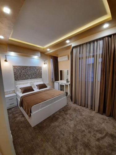 Postel nebo postele na pokoji v ubytování Hotel Juliet Yerevan