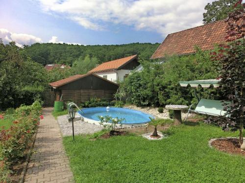 Kolam renang di atau dekat dengan Holiday home in Thuringia with private terrace use of a garden and pool