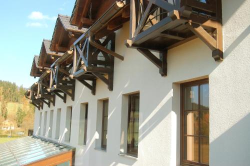 a row of balconies on the side of a building at Wellness Hotel Kempa in Jablunkov