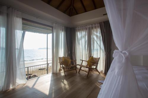 Katil atau katil-katil dalam bilik di The Nest Private Beach Resort