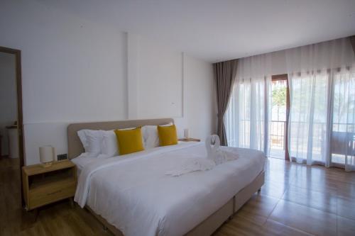 Katil atau katil-katil dalam bilik di The Nest Private Beach Resort