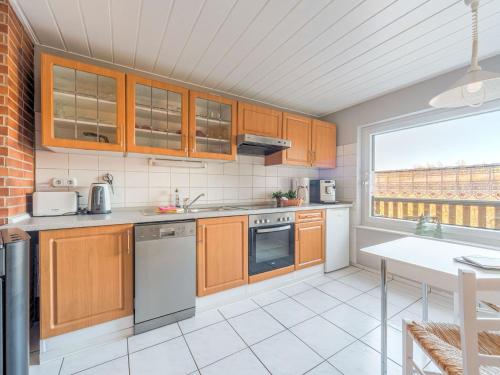 A kitchen or kitchenette at Holiday home with private garden