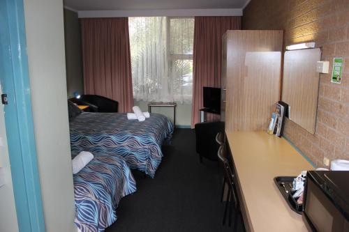 Postel nebo postele na pokoji v ubytování Portland Retro Motel