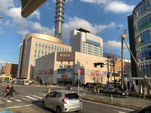 a view of a city with a car on a street at @RLiS_house大阪ドームシティ in Osaka