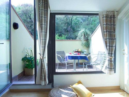 a dining room with a table on a patio at B&B Monte Oliveto in Florence