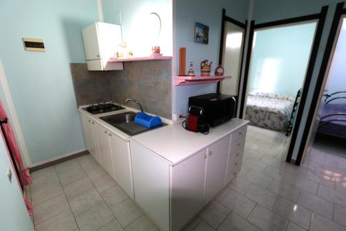 A kitchen or kitchenette at Casa Josto