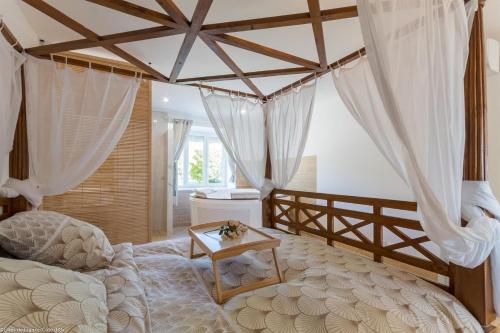 Säng eller sängar i ett rum på Les Crus de Santenay
