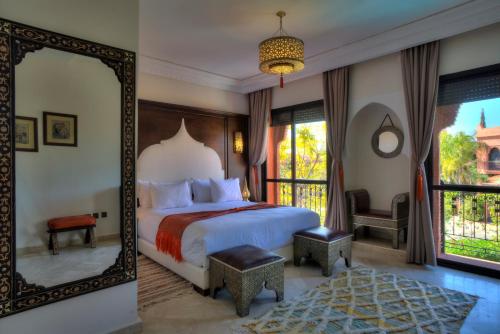 Llit o llits en una habitació de Villa Tilila