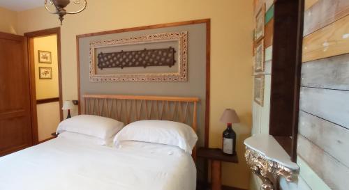 Ένα ή περισσότερα κρεβάτια σε δωμάτιο στο Agriturismo Tenuta La Fratta
