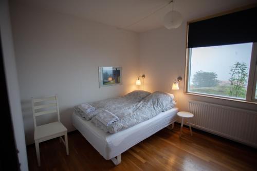 Postel nebo postele na pokoji v ubytování Tórshavn Apartment - In The Center