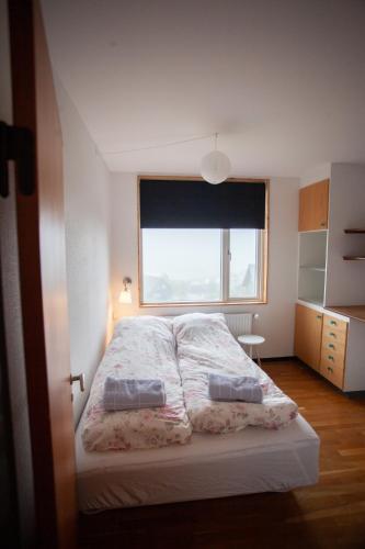 Postel nebo postele na pokoji v ubytování Tórshavn Apartment - In The Center