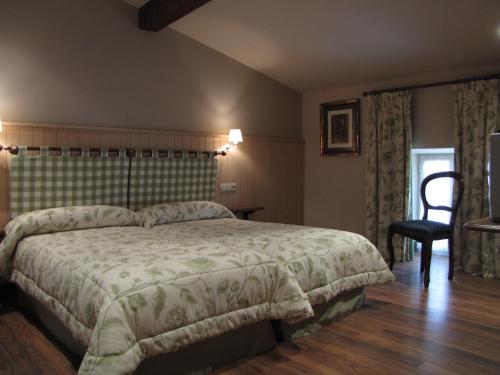 Postel nebo postele na pokoji v ubytování Hostal Beti-jai