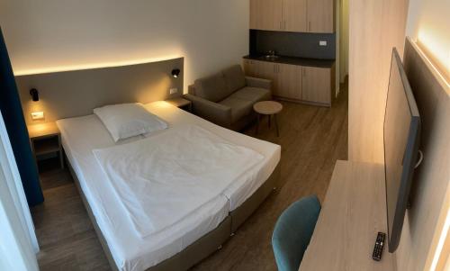 Ein Bett oder Betten in einem Zimmer der Unterkunft Hotel zur Traube