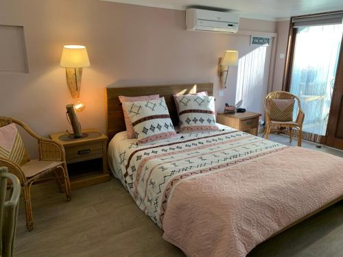 Cama o camas de una habitación en Villa Escandia