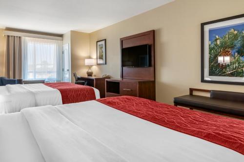 Ένα ή περισσότερα κρεβάτια σε δωμάτιο στο Comfort Inn & Suites