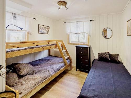En eller flere senger på et rom på Apartment MIDSUND II