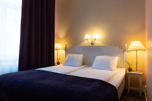 Cama o camas de una habitación en Best Western Hotel Bentleys