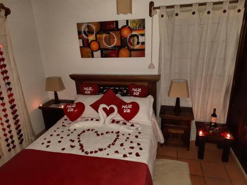 Ένα ή περισσότερα κρεβάτια σε δωμάτιο στο Aparta Hotel El Refugio de María