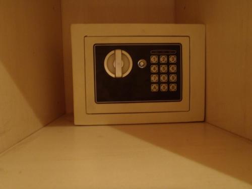 a microwave oven sitting on top of a kitchen floor at GM Rooms Boutique Hotel in La Rioja