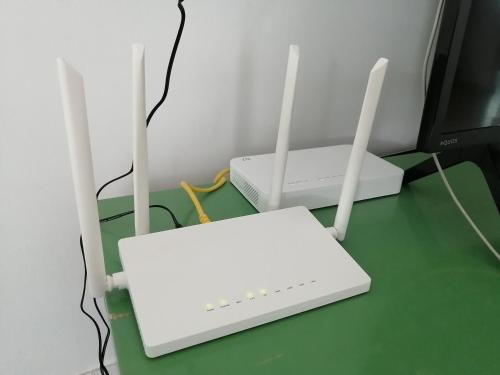 two computer mouses sitting on top of a green table at SarahAisya homestay in Melaka