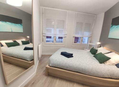 Postel nebo postele na pokoji v ubytování VUT Anayet