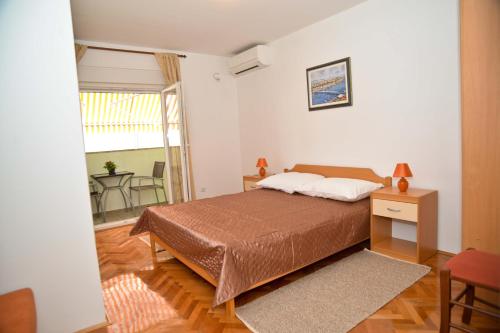 Posteľ alebo postele v izbe v ubytovaní El Mirador Rooms with Balcony