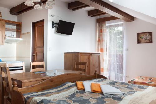 Postel nebo postele na pokoji v ubytování Penzion Planiska