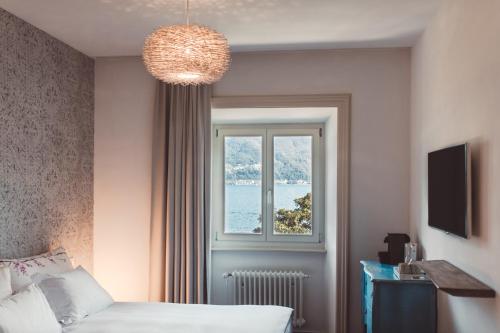 Łóżko lub łóżka w pokoju w obiekcie Hotel Villa Emden