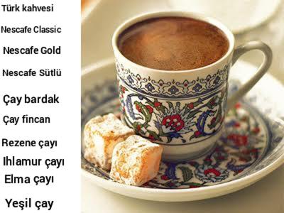 a cup of coffee and a plate with a cup of food at Vespera hotel in Dalyan