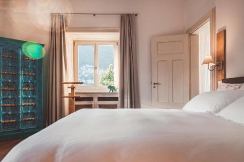 
Łóżko lub łóżka w pokoju w obiekcie Hotel Villa Emden
