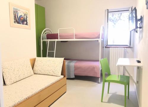Ліжко або ліжка в номері Villa Il Carrubo - Basilicata