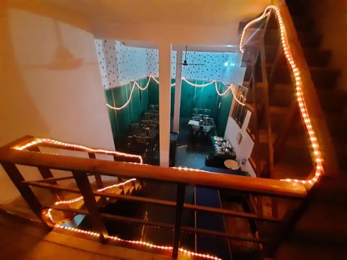 a model of a house with lights on it at Hotel Himalayan Dews Ukhimath in Ukhimath
