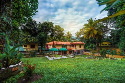 Κήπος έξω από το Mahaweli View Bungalow