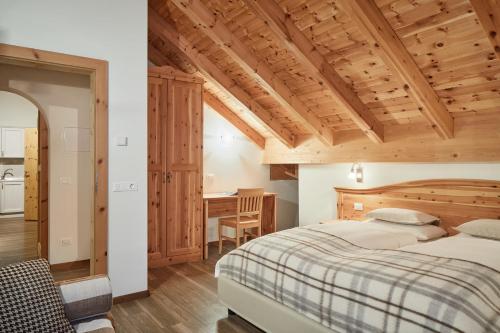Ένα ή περισσότερα κρεβάτια σε δωμάτιο στο Residence Baron