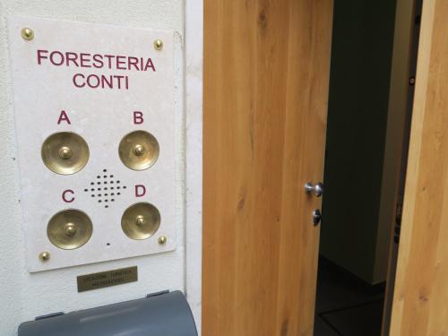 a door with a sign that reads forensics control at Foresteria Conti, sulle tracce di Shakespeare in Padova