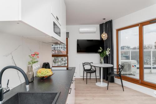 TV a/nebo společenská místnost v ubytování Dream4You Apartments