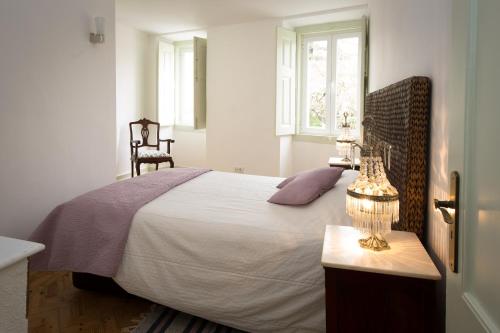 Postel nebo postele na pokoji v ubytování Tram Apartments