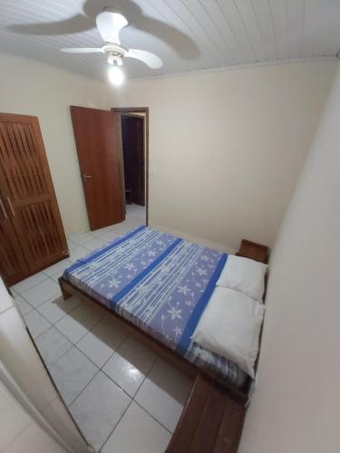 Ένα ή περισσότερα κρεβάτια σε δωμάτιο στο Residencial Luanda