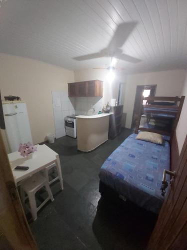 Ένα ή περισσότερα κρεβάτια σε δωμάτιο στο Residencial Luanda