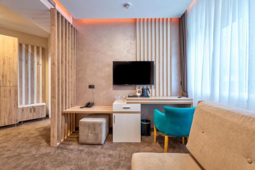 Televisyen dan/atau pusat hiburan di Hotel Aria