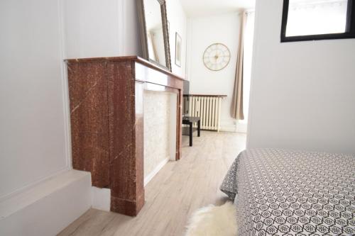 Katil atau katil-katil dalam bilik di CHIC APPART DESIGN - HYPER CENTRE - TRAMWAY - FREE WIFI - leRelaisdOdile12