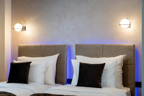 Katil atau katil-katil dalam bilik di Hotel Aria