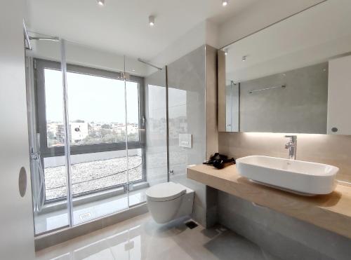 Ένα μπάνιο στο Verde Apartments