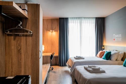 Postel nebo postele na pokoji v ubytování TK Bed