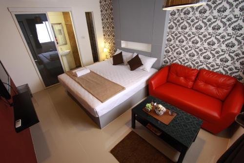 Postel nebo postele na pokoji v ubytování Bearing26 Hotel